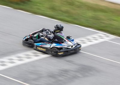 Driving over the checkered line while racing at Morac Adventure Park, Langkawi, Malaysia